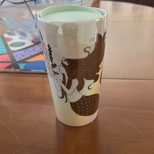 Starbucks coffee mug with a mermaid on it